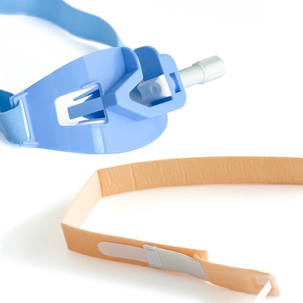 Fixation for tracheal tube (such as ribbon gauze or tape)